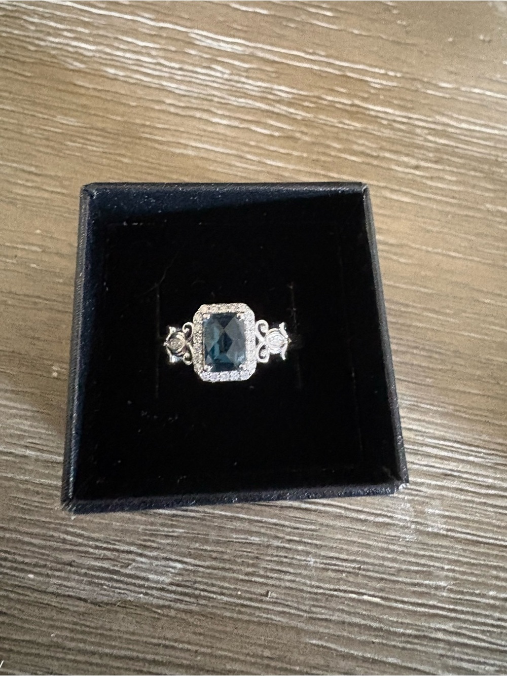 Sterling Silver Ring with genuine blue topaz and diamonds
